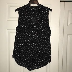 Torrid sleeveless black and white shirt.